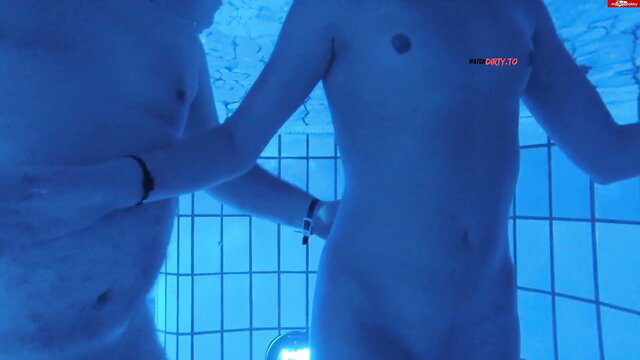 HornyRoxy nude in blue tiled pool, slim athletic body teasing