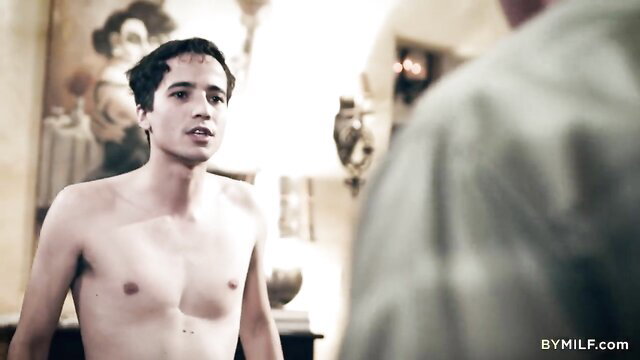 Shirtless young stepson facing MILF Christie Stevens in steamy threesome setup