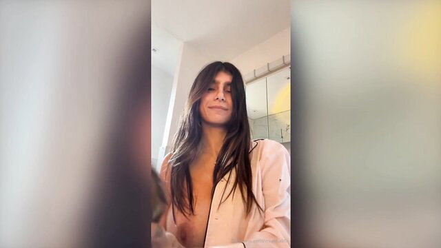 Mia Khalifa sexy nude tease in open blazer, bare tits exposed