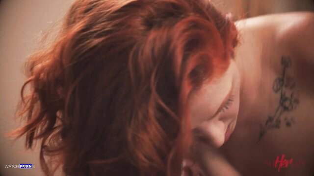 Redhead Cherry Candle topless with cherry blossom tattoo on back