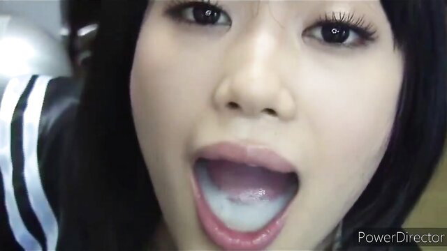 Asian girl with open mouth showing tongue