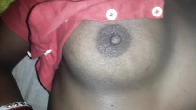 Indian Bhabhi's huge dark areola nipple closeup in red dress tease