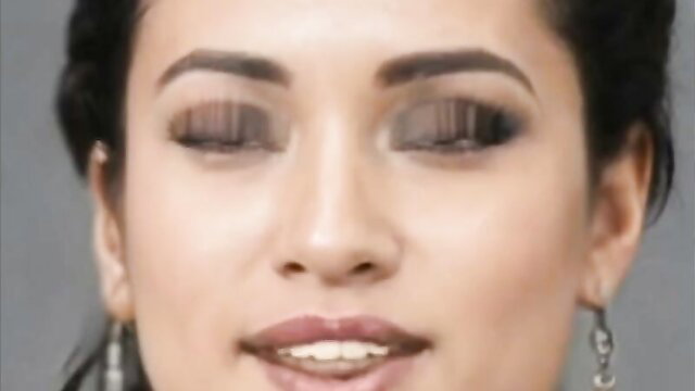 Closeup smiling Mexican beauty with smoky eyes and glossy lips
