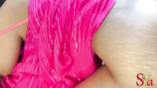 Desi Bhabhi in shiny pink dress, curvy hips exposed