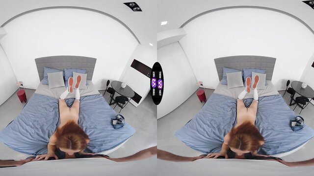 Hot redhead nude on bed, legs up in POV, sucking toy like a pro