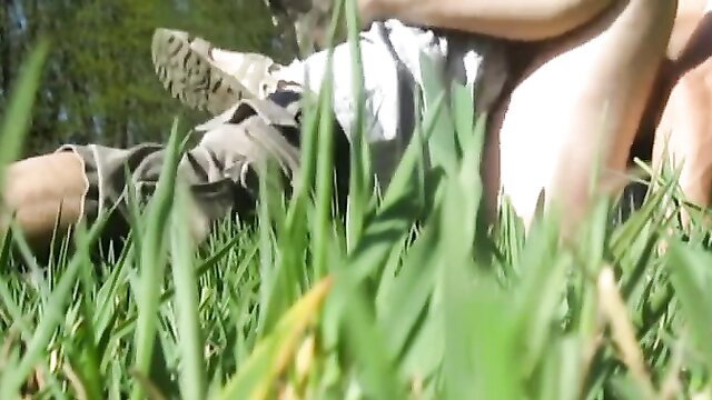 Horny couple caught fucking outdoors in grass, upskirt pussy view