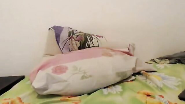 Hairy bush slut moans pleasuring her wet pussy with toy on bed