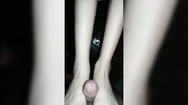 Sissy shemale feet teasing hard cock closeup