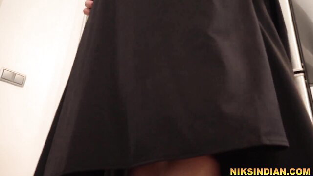 Muslim stepsis in hijab lifts black dress exposing legs in taboo tease