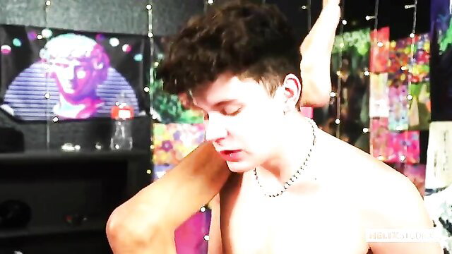 Curly-haired twink passionately kisses neck of slim exotic girl