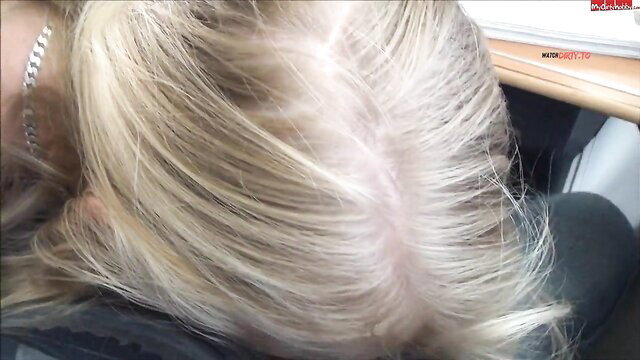Blonde MILF KacyKisha closeup with platinum hair and gold chain