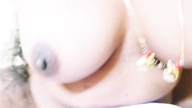 Closeup of stepmom's big tits with necklace, blurred nude tease