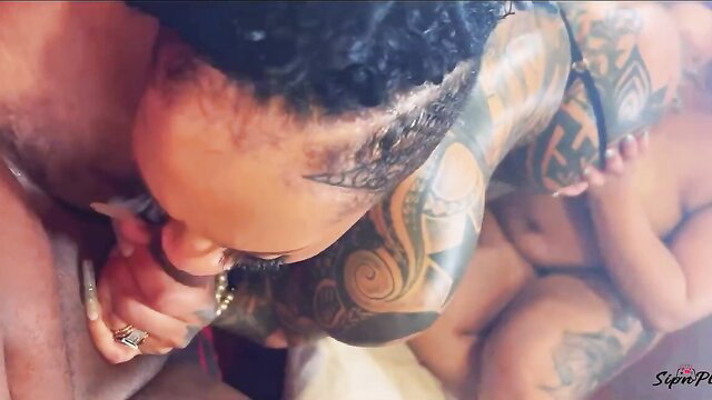 Ebony MILF with tattoos rides cock reverse cowgirl dominating