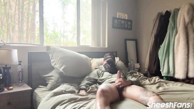 Haleigh Cox man stroking cock on bed in amateur solo tease