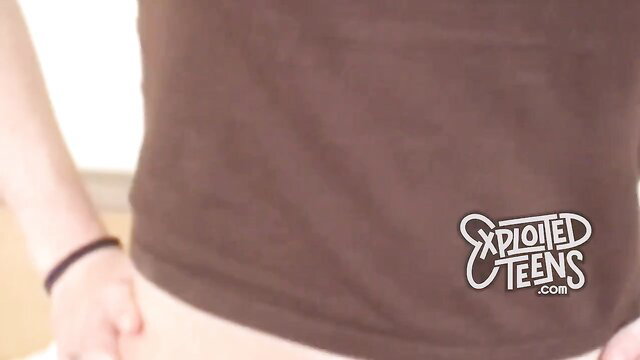 Petite brunette teen in Exploited Teens crop top, small tits audition tease