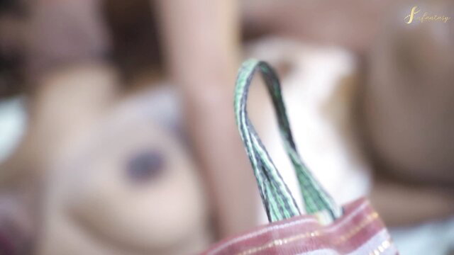 Blurry closeup of green woven bag handle on naughty Canadian stepmom video thumbnail