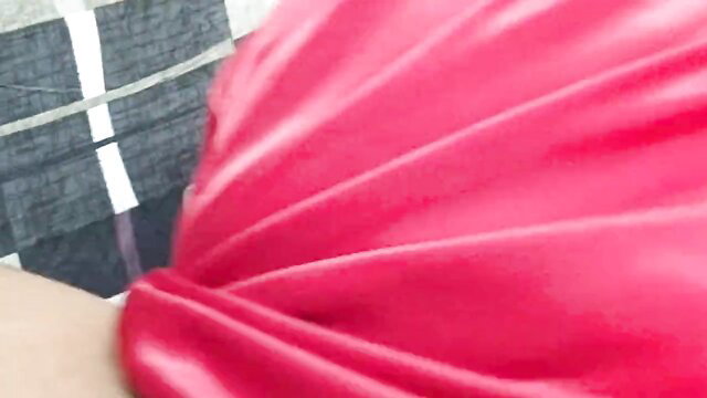 Indian stepmom in red satin dress draped seductively closeup