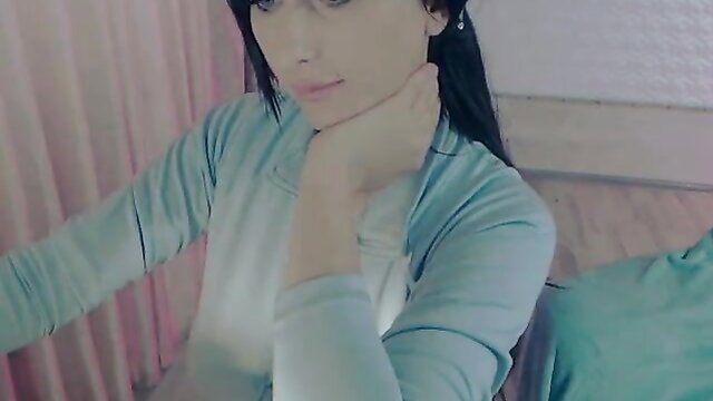 Ukrainian amateur babe in teal top poses seductively on webcam