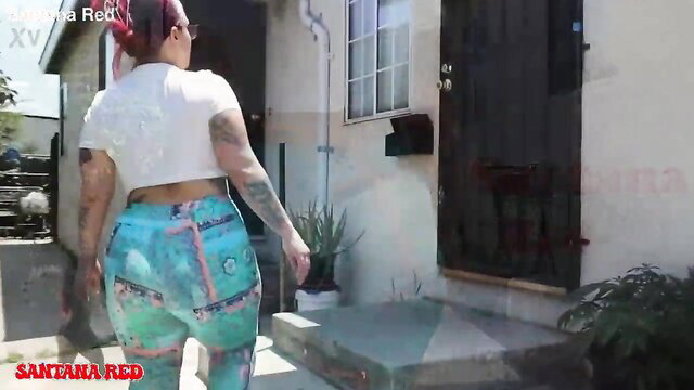Santana Red thick ebony in tight leggings walking to door