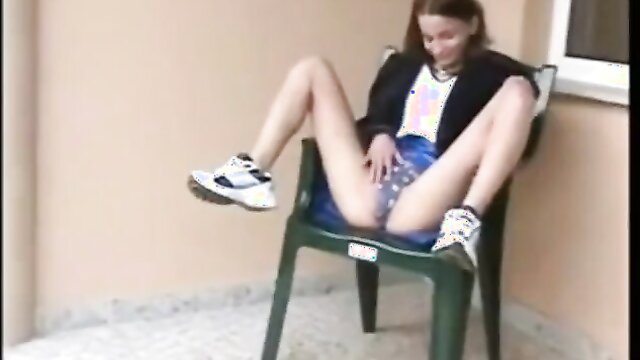 Slim brunette teen spreads legs on chair flashing pussy in skirt, power pissing tease