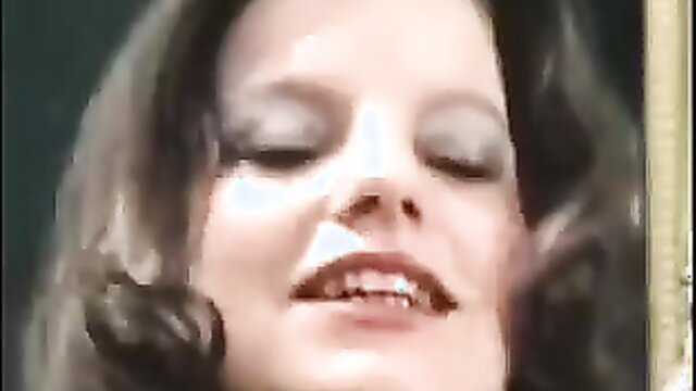 Tiny Tove closeup face with glossy red lips in Piss Service