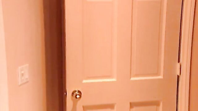 Dino Bravo by open door in bedroom, young redhead teaser