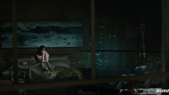 Dakota Johnson nude praying pose in bed, Fifty Shades Darker scene