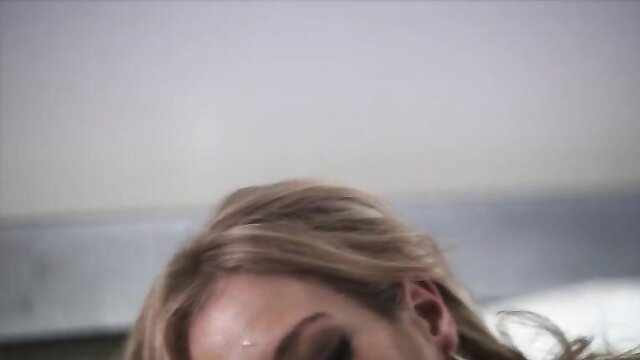 Blonde beauty closeup with sultry eyes, ready for high heels cock stroking