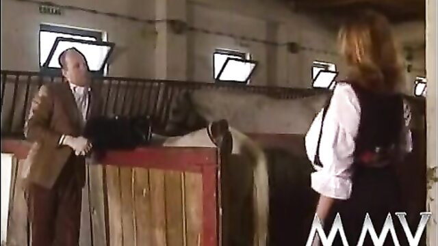 Blonde German beauty in suspenders eager to suck dick in stables