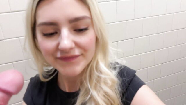 Eva Elfie holds pink dildo close-up in bathroom selfie