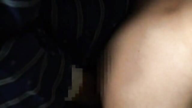 Pretty Japanese housewife in striped dress teases with cleavage