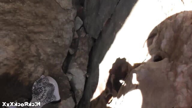 Loren Strawberry's patterned hat in rocky Turkish beach crevice, big boobs public tease