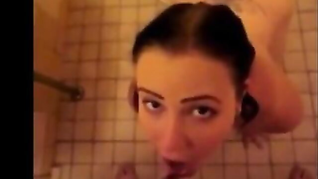 Hot brunette upside down in shower, mouth open wide for piss wake up