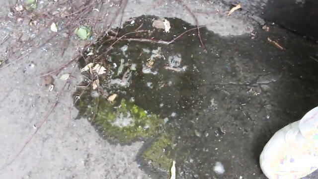 BBW squatting over wet puddle with moss, outdoor pee leak