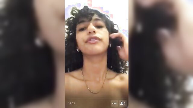 Curly-haired Latina LolaLightning topless on phone call NSFW