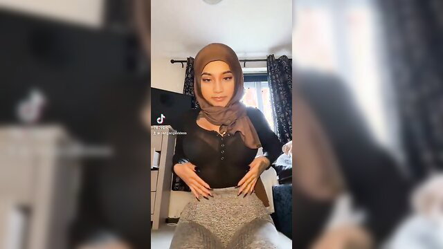 Yasmina Khan hijabi in tight top and leggings, oiled boobs hard nipples
