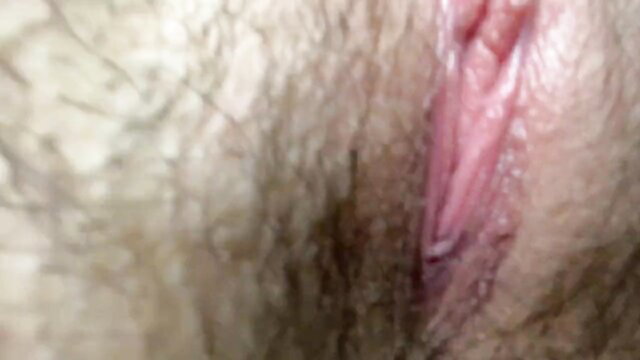 Close-up of hairy mature pussy with pink labia, mommy fetish tease