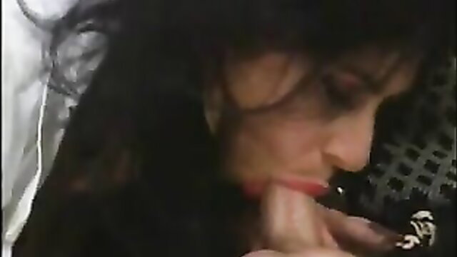 Mature Italian woman close-up blowjob, sultry lips and dark hair