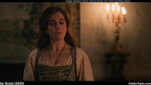 Elle Fanning in low-cut corset dress from The Great nude scenes