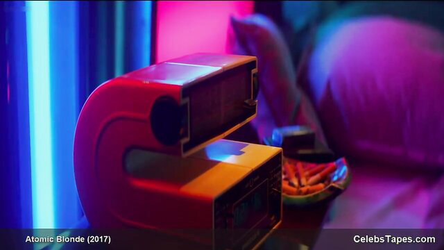 Charlize Theron sexy bedroom scene with Sofia Boutella