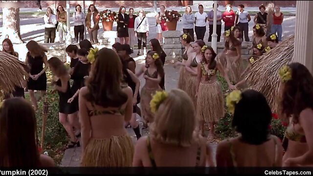 Christina Ricci & Erinn Bartlett in grass skirts & bikinis at topless luau party