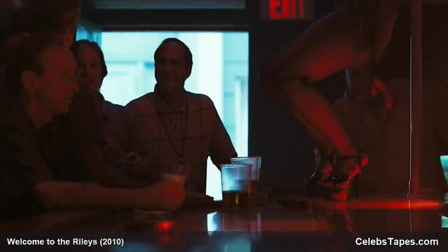 Kristen Stewart as stripper on pole in red lit club, hot legs in heels