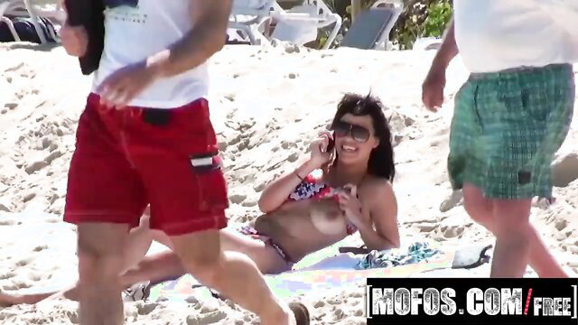 Stacey Foxxx in skimpy bikini sunbathing at beach Mofos