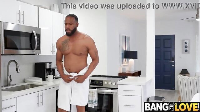 Muscular black man shirtless in towel in kitchen Bang Love video