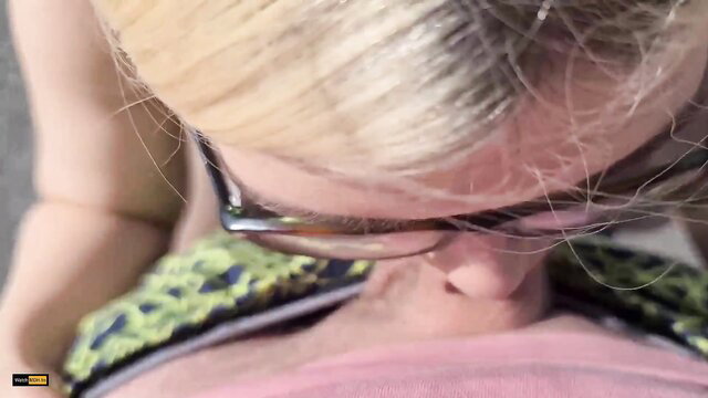 Blonde Mariella Sun in glasses gets facial cumshot on tits closeup