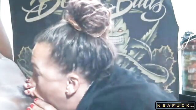 Buxom brunette MILF deepthroats big cock closeup