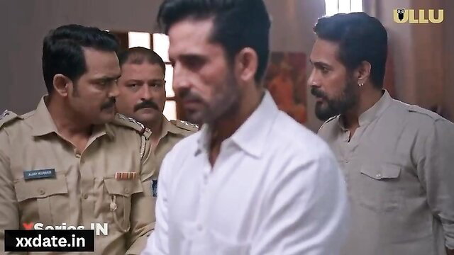 Hot Indian Bhabhi surrounded by men in police uniforms, romantic tease