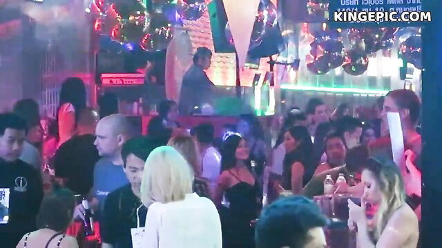 Crowded Asian nightclub hookup party with hot Asian and tourist girls dancing
