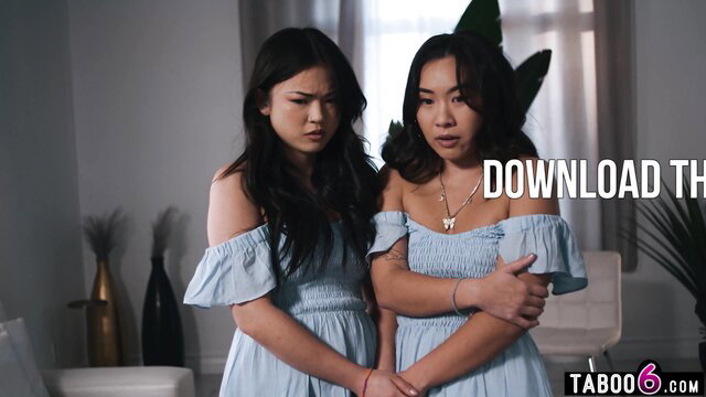 Asian teen stepdaughter twins in blue off-shoulder dresses hugging nervously