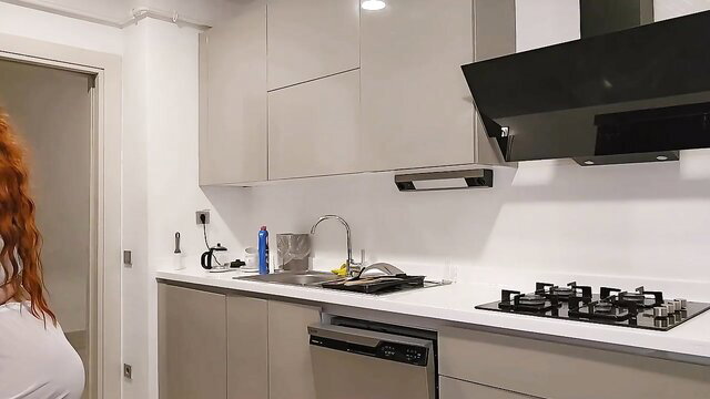 Janicemartinezzz redhead in tight white top in kitchen